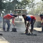 Renovación Vial en Flor Amarillo: Aplicación de 400 Toneladas de Asfalto fortalece la infraestructura urbana